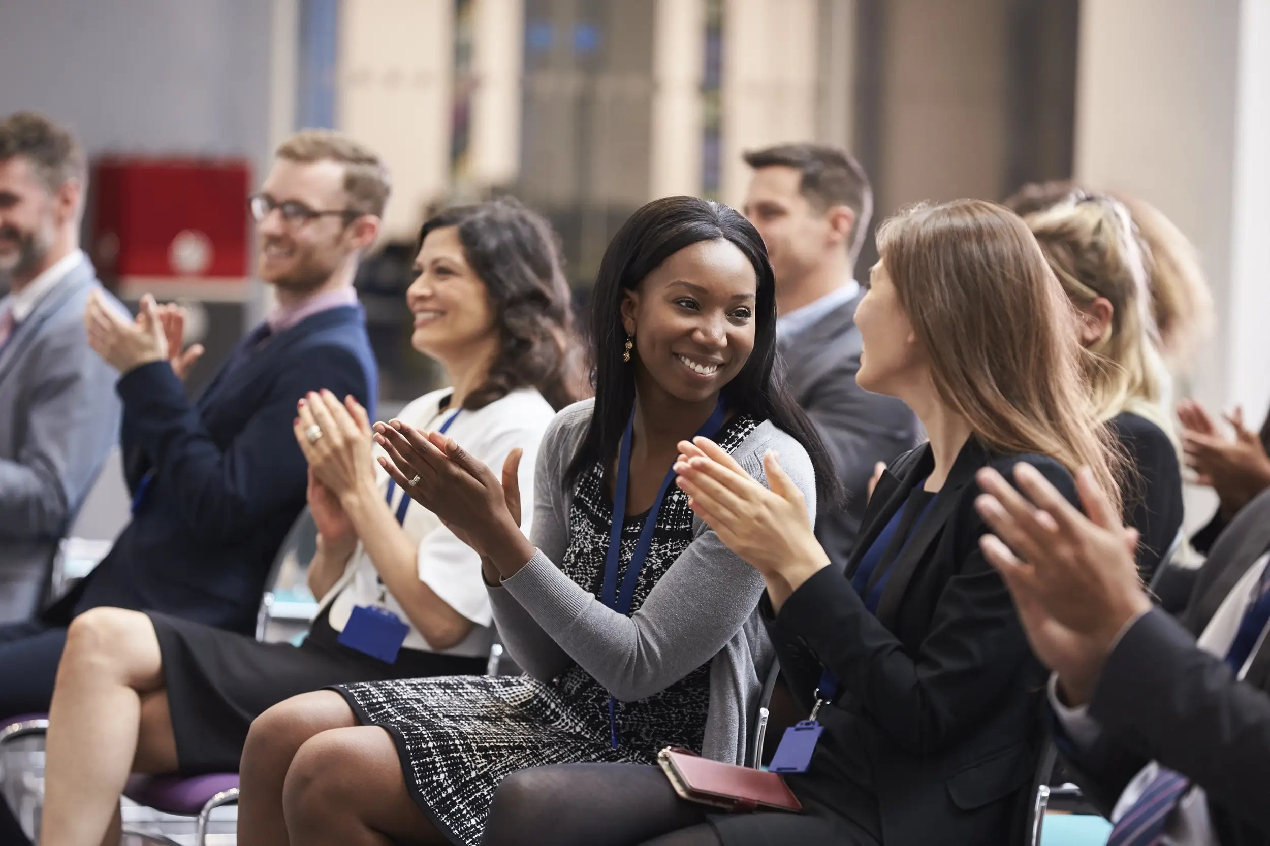 In-person Conference Audience Applauding and Talking