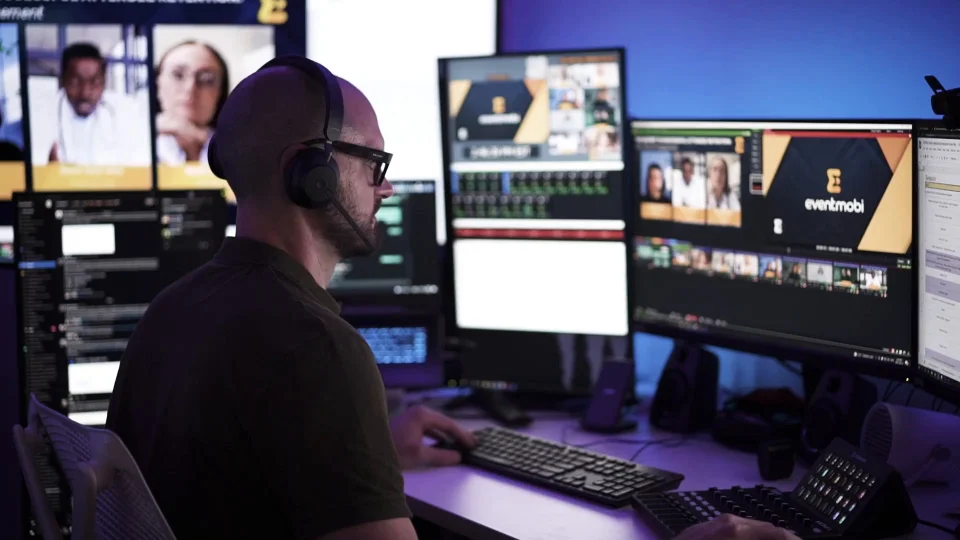 Virtual event production studio with cameras, lighting, and livestream setup